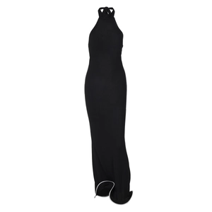 Close-up of black halter neck slim dress featuring delicate white lettuce edge trim details