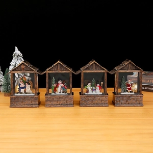 Set of four vintage bronze Christmas lantern music boxes with nativity and Santa scenes