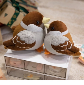 Macro detail of pair sparrow plush toys with soft texture and realistic stitching details