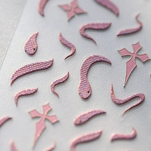 Pink glitter snake and gothic cross nail art stickers with embossed holographic texture
