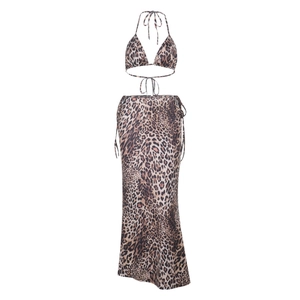 Detail of leopard print halter bikini top and matching tie-waist long skirt set