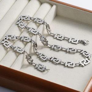 Minimalist silver stainless steel geometric hollow chain necklace in white jewelry box