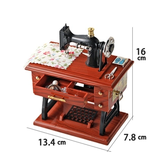 Vintage sewing machine music box with wood texture and functional drawer storage