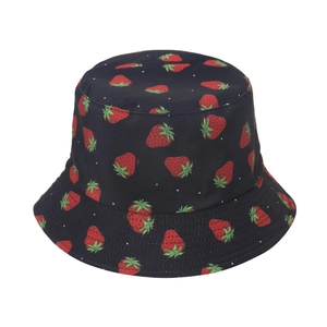 Close-up of cute strawberry embroidery and stitching on a black reversible bucket hat