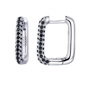 Macro detail of S925 sterling silver rectangular earrings with micro-paved black zircon