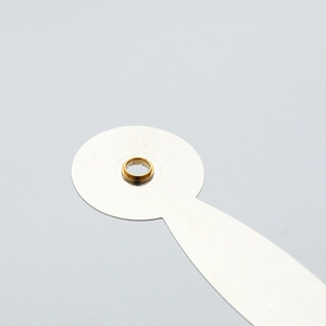 Modern silver quartz wall clock hands with precise gold metal mounting hole detail