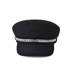 Classic black baker boy hat with silver chain detail and vintage peak cap design