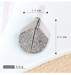 Detail of fan-shaped pendant with white zircons showing 1.7cm width and 2.1cm height