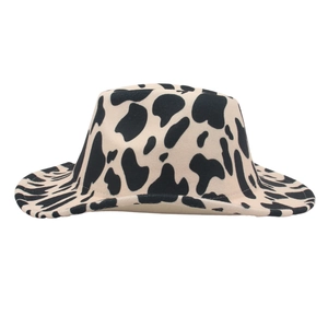 Classic cow print felt cowboy hat with a wide curved brim on a clean white background