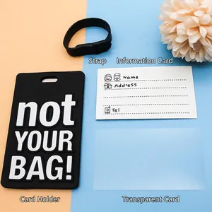Black PVC luggage tag with 'not YOUR BAG!' lettering and ID card on blue-orange background