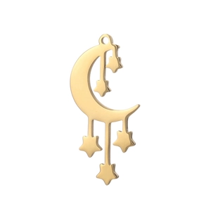 Detailed close-up of a gold-colored crescent moon pendant with five dangling star charms
