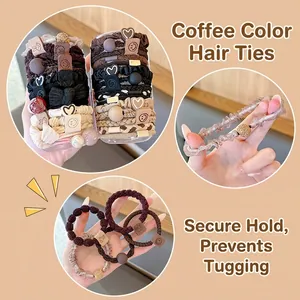 Brown elastic hair tie set featuring resin bear and pearl accents for high ponytails