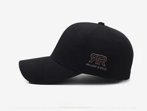 Detailed close-up of side embroidery RR NOTRE PARIS on black twill baseball cap