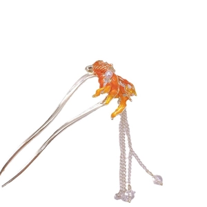 U-shaped hair pin with goldfish design, orange enamel, pearl, and long metal tassels