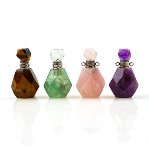 Natural crystal gemstone essential oil bottle pendants in amethyst, quartz, and fluorite