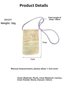 Detail view of plush crossbody phone bag showing 17cm height and velcro closure