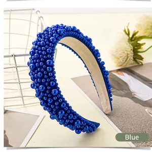 Luxurious padded blue pearl headband for women featuring all-over faux pearl embellishments