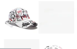 Detailed close-up of white baseball cap with colorful graffiti and embroidered text