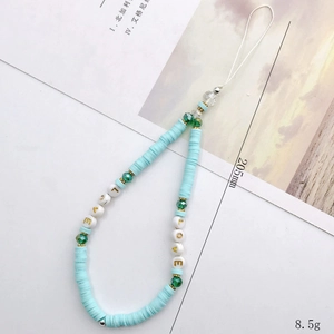 Handmade beaded phone charm with mint green clay discs and golden LOVE letter beads