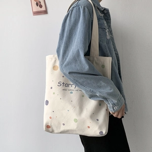 Sac fourre-tout en toile blanche avec pois colorés et citation pour un usage quotidien