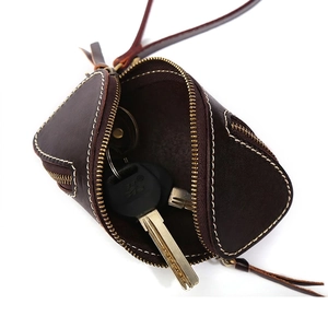 Vintage dark brown vegetable tanned leather key pouch with zipper and fine stitching details