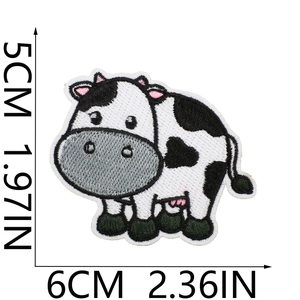 Detailed view of cute cow embroidered patch with clear dimensions of 5cm by 6cm