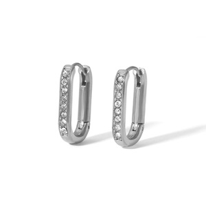 Macro view of rectangular stainless steel hoop earrings with double row cubic zirconia
