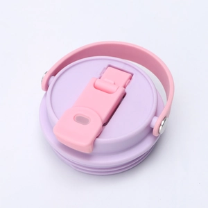 Detail of the purple and pink leak-proof lid with handle for a 30oz tumbler