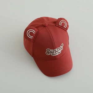 Red kids baseball cap with ears and Sunset Sunrise embroidery on a white background