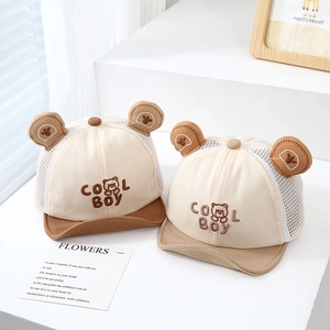 Detail of baby mesh sun hats with cute bear ears and Cool Boy embroidery for summer