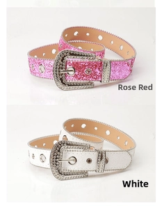 Detail of rose red and white western belts with glitter straps and rhinestone buckles