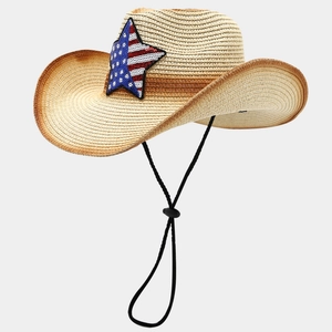 Detailed view of woven straw cowboy hat featuring American flag star sequin and drawstring