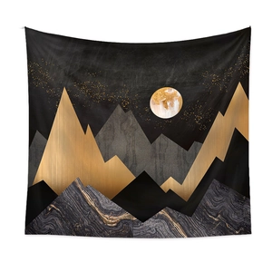 Detailed close-up of abstract black and gold mountain tapestry with moon and marble texture