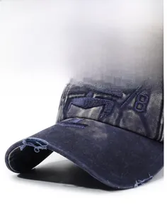 Detailed view of 3D 78 embroidery on washed distressed denim cotton baseball cap