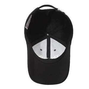Internal view of black embroidered baseball cap showing sweatband and reinforced stitching