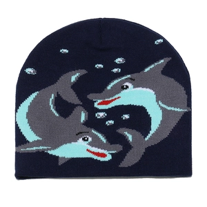 Texture tricotée détaillée du bonnet bleu marine avec broderie dauphin et motifs bulles