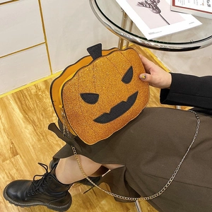 Quirky pumpkin shaped glitter crossbody bag with gold chain for Halloween fashion