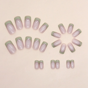 Glossy sage green French square press-on nails set with natural pink base and chic finish