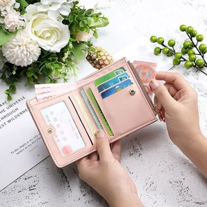 Pink minimalist short folded wallet for women with card slots and zipper compartment