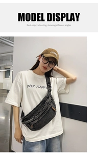Street style model wearing a vintage washed denim crossbody chest bag in dark grey finish