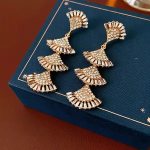 Elegant multi-layer fan-shaped tassel earrings with sparkling rhinestones in gold finish
