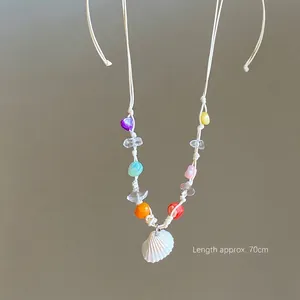 Detailed view of colorful beaded necklace with natural shell pendant, approx 70cm length