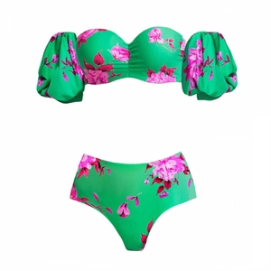 Three-piece floral bikini set in green with pink flowers and puffed sleeves