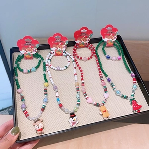Kids Christmas beaded jewelry sets with reindeer snowman and gingerbread man pendants