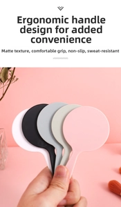 Detail showing round hand mirrors with matte texture, non-slip handle and compact design