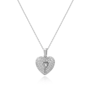 Detail of silver heart necklace with micro-paved clear cubic zirconia and center stone