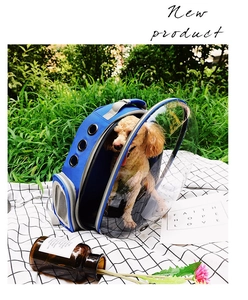 Detail of blue pet backpack with transparent space capsule window and ventilation holes