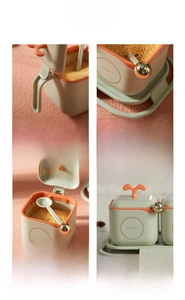 Detail view of four-compartment seasoning box set with spoons and grey non-slip base tray