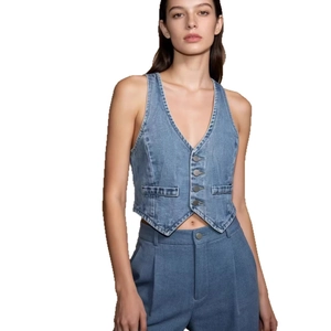 Vintage slim-fit blue denim vest for women with washed texture in a minimalist style