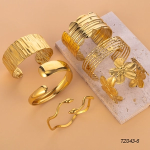 6-piece gold plated stainless steel open bangle set with butterfly flower and snake designs